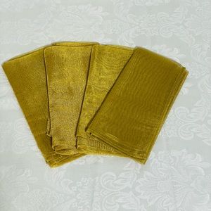 Napkins. Sheer Gold. Lot of 6. Used no stains. Tags have been cut off.